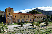 Hania, the Akrotiri peninsula. The Gouvernetou Monastery, surrounded by a thick rectangular wall with at the corners square towers with embrasures and scorchers. 